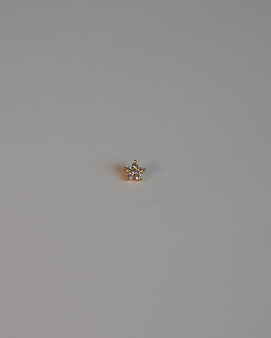 Piercing Mini Estrella Dorada con Circonitas